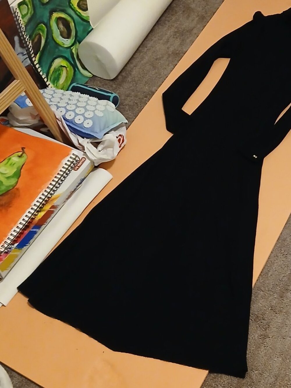 Ribbed Tommy Hilfiger turtleneck maxi dress is black.